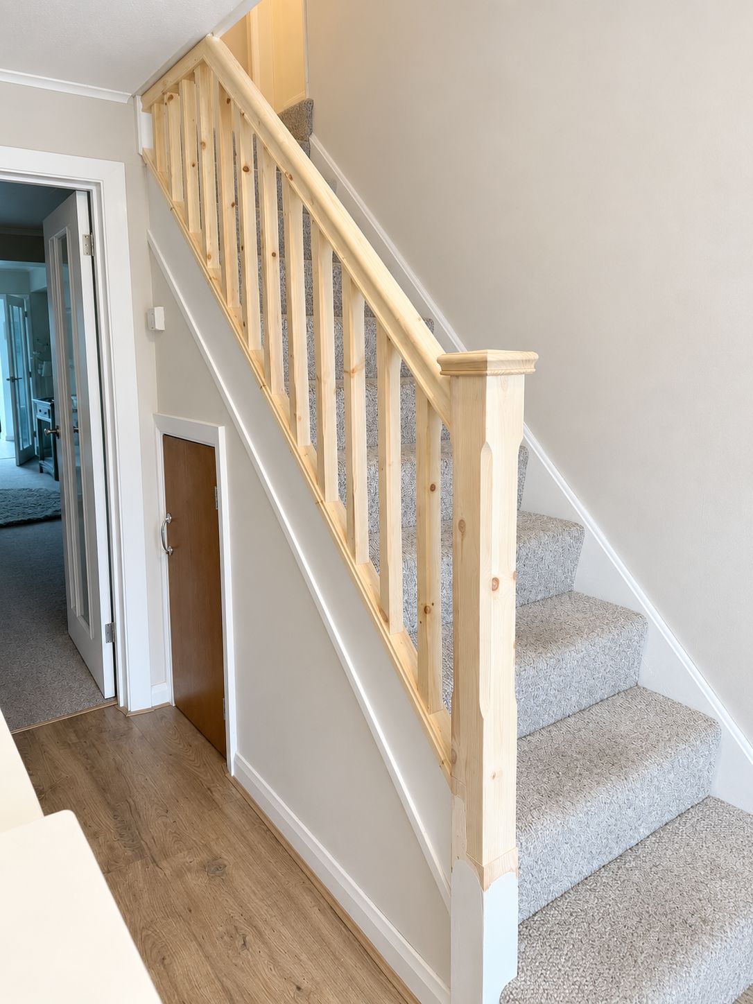 New pine staircase balustrade with newel post and spindles fitted in Leicester