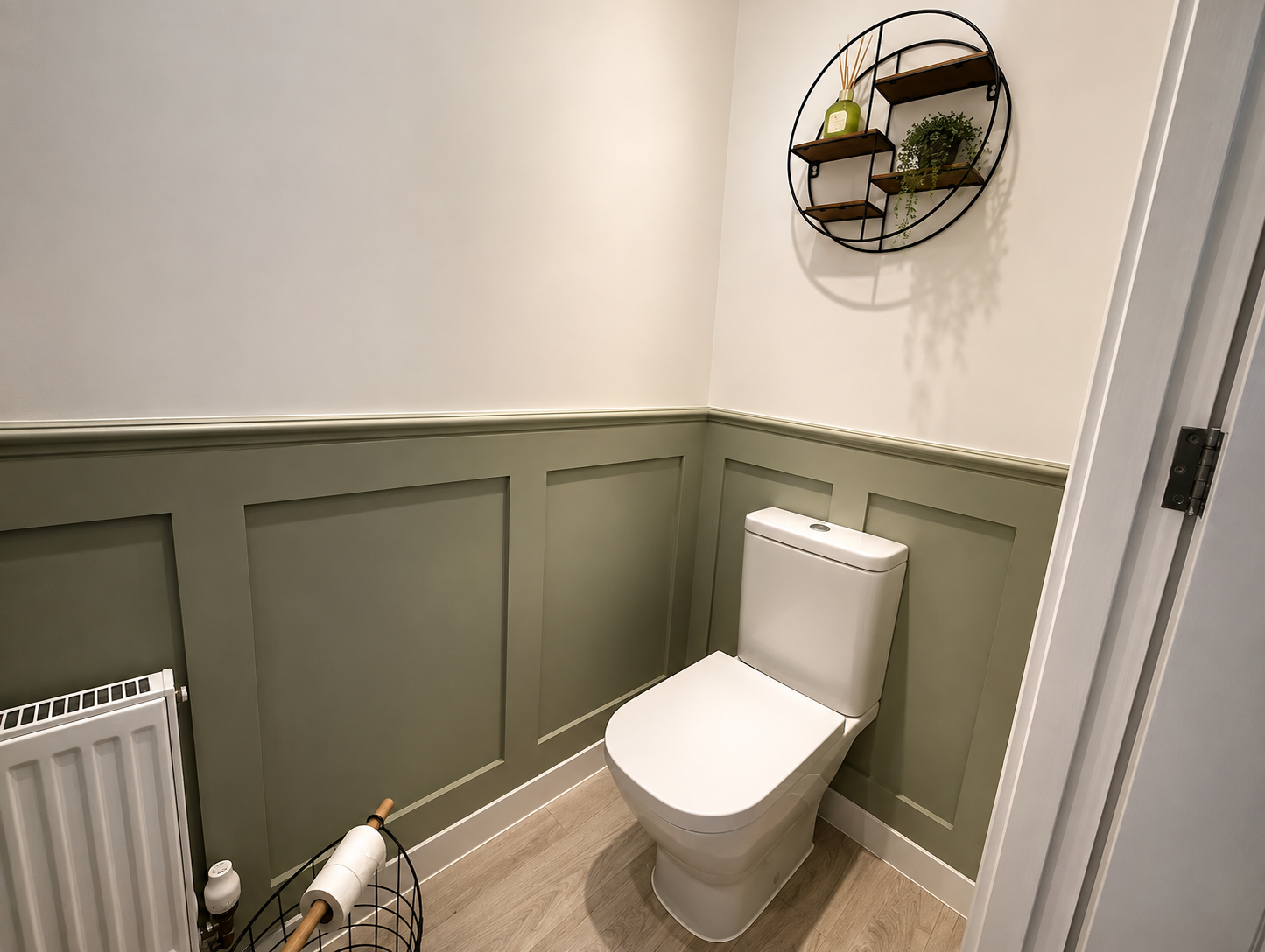 Downstairs WC with hand-built sage green wall panelling